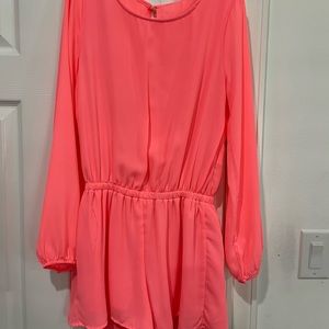 Has a fun open back; it’s never been worn and I’m great condition!